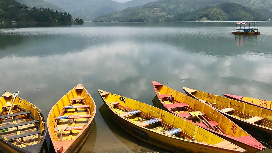 Begnas Lake, located in Lekhnath, Kaski District, Nepal, is a tranquil freshwater lake surrounded by rural villages and scenic Himalayan foothill