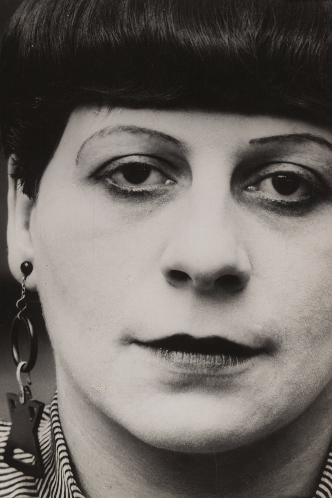 Lucia Moholy (American, born Hungary. 1895–1946). Florence Henri. 1927. Gelatin silver print. 14 5/8 x 11″ (37.2 x 27.9 cm). The Museum of Modern Art, New York, Thomas Walther Collection. Gift of Thomas Walther © 2014 Artists Rights Society (ARS), New York/VG Bild-Kunst, Bonn