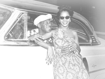 An African American couple in their car before going on the road to anxiety