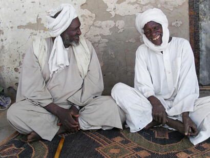 Enikö Nagy, Aage companions share a friendly visit. In Al Gaa Viallge, North Kordofan 
