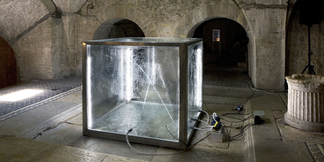 Donato Piccolo, Hope Impluviumâ 2009 glass, aluminium, water, gas nebula, electric motor, hydraulic pumps, neon, sound woofer, amplificator, dim. 110x110x108cm, Photo Ela Bialskova