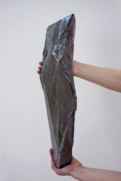 Michael Dean, Untitled, 2009, black cement, 55 x 25 x 3 cm. Courtesy of Workplace Gateshead