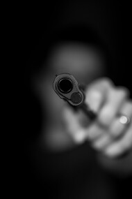 A gun pointed at the observer-violence begets violence