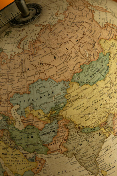 A vintage globe displaying South Asia and Europe