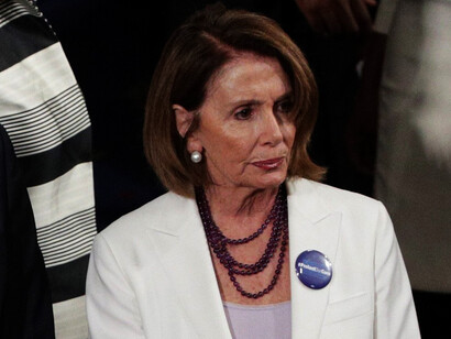Nancy Pelosi wearing white