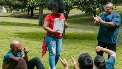 Community celebrates a woman's achievement 