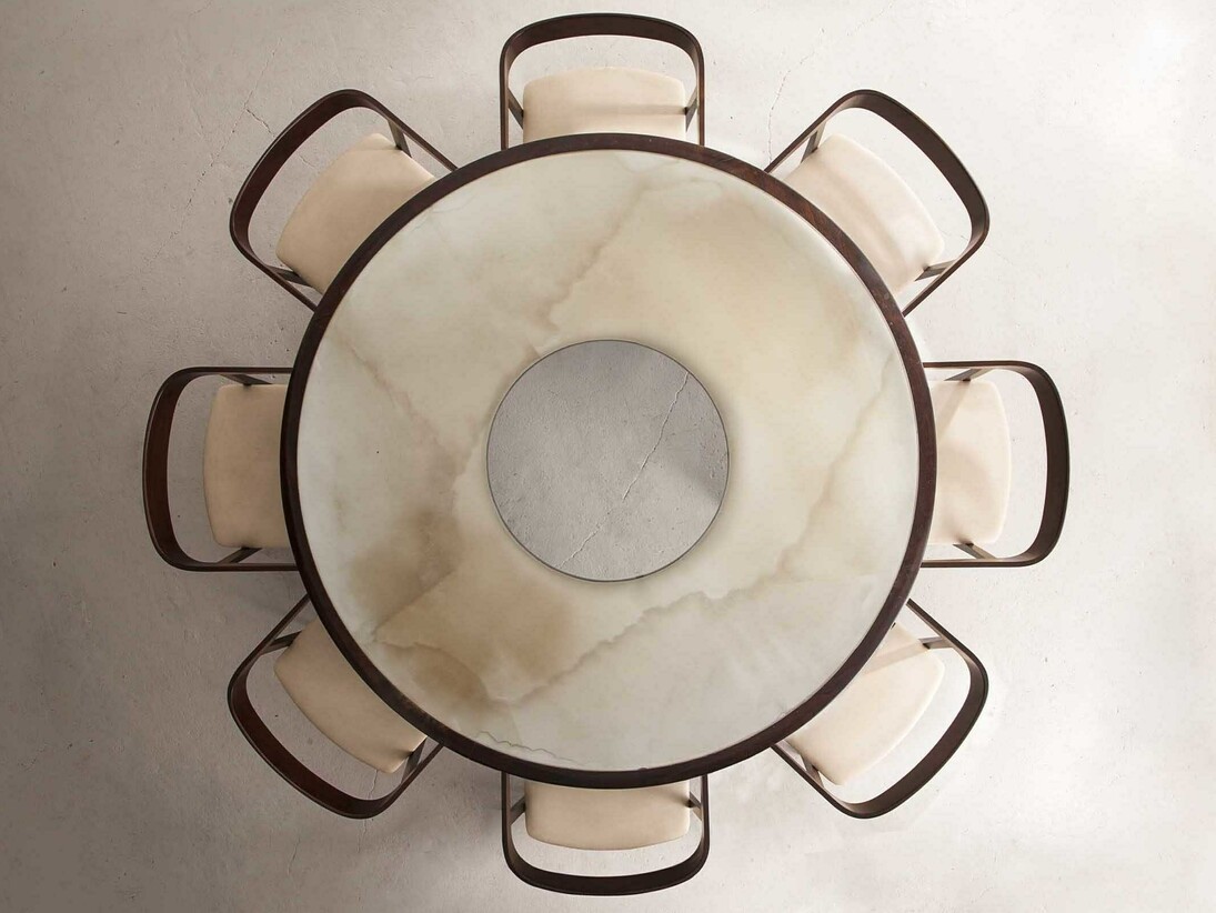 Round Dining Table and Curved Back Chairs by Joaquim Tenreiro at R & Company