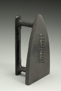 Man Ray
American, 1890‒1976
Gift (Cadeau)
1921 (1963 edition)
Flat iron and nails
6 ¾ x 3 15/16 x 2 13/16 in. (17.1 x 10 x 7.1 cm)
Sidney and Lois Eskenazi Museum of Art