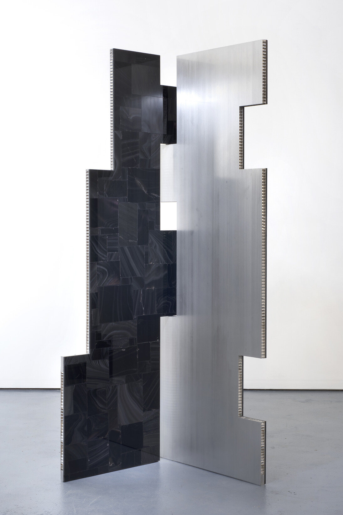 Mark Hagen, A parliament of some things (Additive and Subtractive Sculpture, Obsidian Screen, Panels 1 & 2), 2014, Volcanic glass, epoxy on aluminum honeycomb panel, 2 parts: 84” x 30” (1); 84” x 30” (2)
© Mark Hagen - Photographer unknown, all rights reserved, Courtesy of the Artist and Almine Rech Gallery