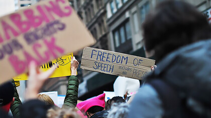 Women's March in New York, a banner says: Freedom of Speech Includes The Press, USA