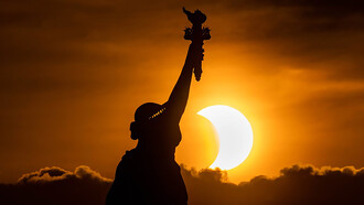 Statue of Liberty, annular solar eclipse, New York, United States