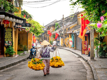 The historic streets of Hoi An, Vietnam, come alive with colorful lanterns, local visitors, and beautifully preserved heritage buildings