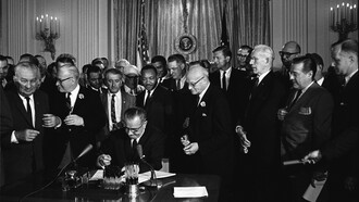 The signing of landmark civil rights legislation in the 1960s marked a pivotal moment in U.S. civil rights history, one of Ramparts Magazine's concerns