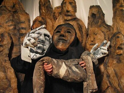 The Bread and Puppet Theatre, Tableau of three puppets. Photo © Jonathan Slaff
