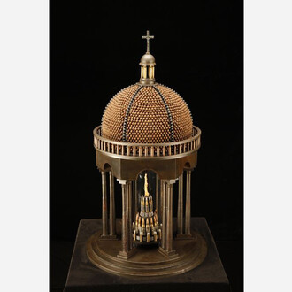 Al Farrow, The Middle Finger of Santo Guerro, 2021-2022. Gun parts, bullets, cartridge shells, gears, steel, glass, bone, and crucifix. Courtesy of the artist and Catharine Clarke Gallery