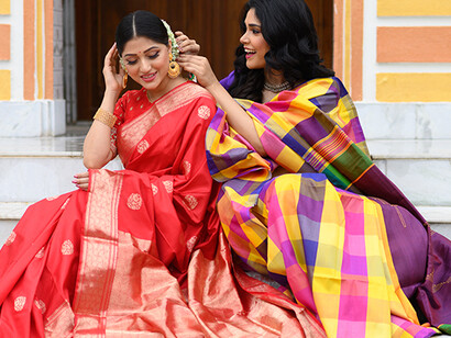 Women dressed from the Tantuja Emporium. Varanasi, India 