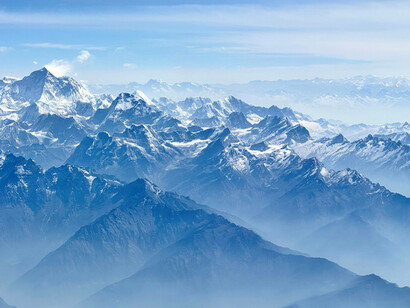 Stunning aerial view of Mount Everest from an airplane cabin