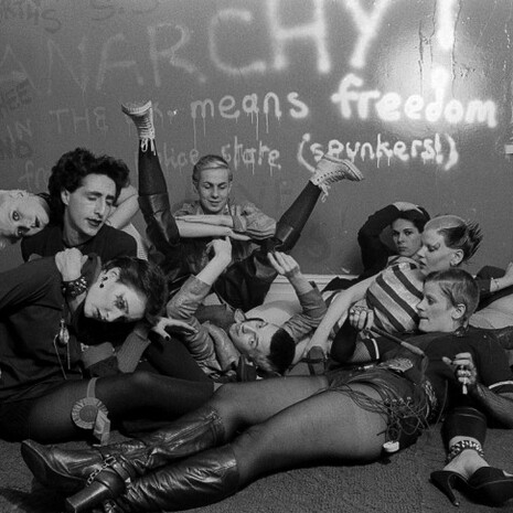 The Bromley Contingent' - Siouxsie Sioux, Philip Salon, Debbie Juvenile, Simon Barker, Steve Severin, Berlin, Soo Severin, Sharon Hayman and Linda Ashby at Linda Ashby's flat, Oct 1976