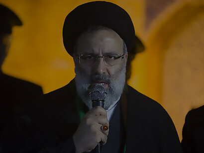 Ebrahim Raisi, also known as Seyyed Ebrahim Raisos-Sadati, serves as an Iranian cleric and holds the position of custodian and chairman at Astan Quds Razavi, a prominent and influential bonyad foundation