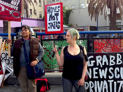 In a powerful demonstration, housing activists march together, demanding justice and holding banners that declare ‘Housing is a right