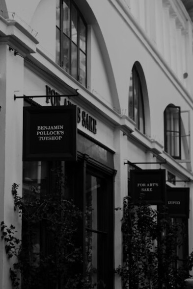 A black-and-white photo of a storefront in Covent Garden, London