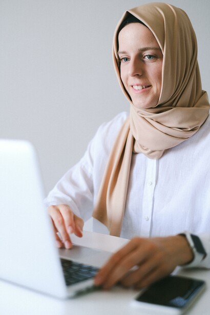 Woman looking at her laptop