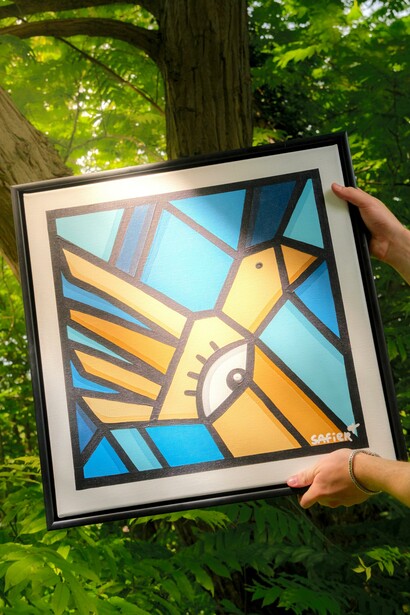 Pássaro em quadro de arte cubista