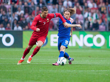 Croatia’s Luka Modrić and Portugal’s João Moutinho compete for the ball during an international friendly match on 10 June 2013