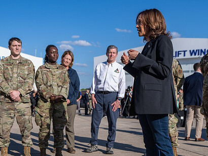 Vice President Kamala Harris speaks with service members after receiving a briefing on Hurricane Helene recovery efforts, Saturday, October 5, 2024, outside a National Guard Operations Building in Charlotte, North Carolina, USA