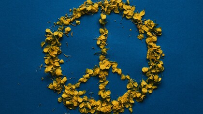 The symbol of peace displayed in the traditional colors of Ukraine