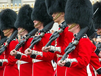 British royal guards marching in precise formation, reflecting the discipline and continuity of tradition amid national decline
