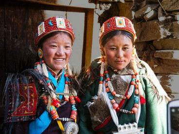 Two gorgeously dressed Sherpas in Nepal's Solukhumbu region. Deeply rooted in Tibetan Buddhism