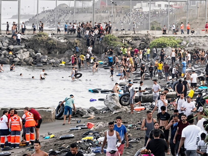 Thousands crossed from Morocco into Ceuta in an unprecedented mass movement, overwhelming the city and prompting a forceful border response