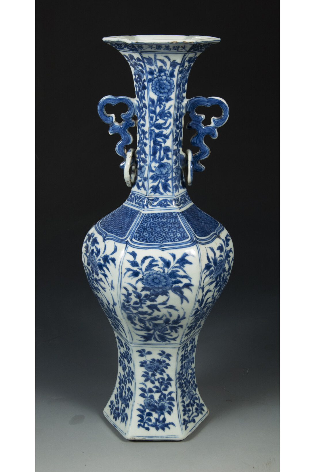 Blue + White porcelain vase. Porcelain vase with blue floral decoration
