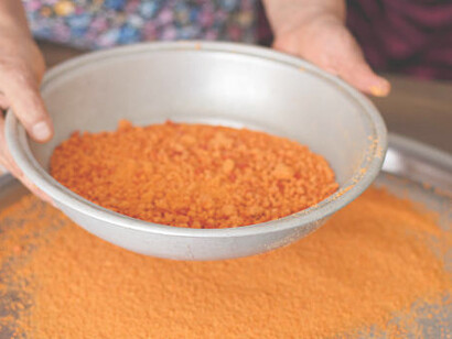 The initial steps in making Turkish Tarhana soup include fermenting yogurt with various vegetables and spices, resulting in a savory and nutritious meal