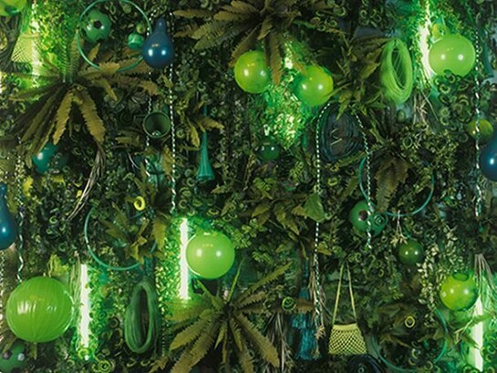 Green Lush, 1998-9, Plastic objects, lights and wood