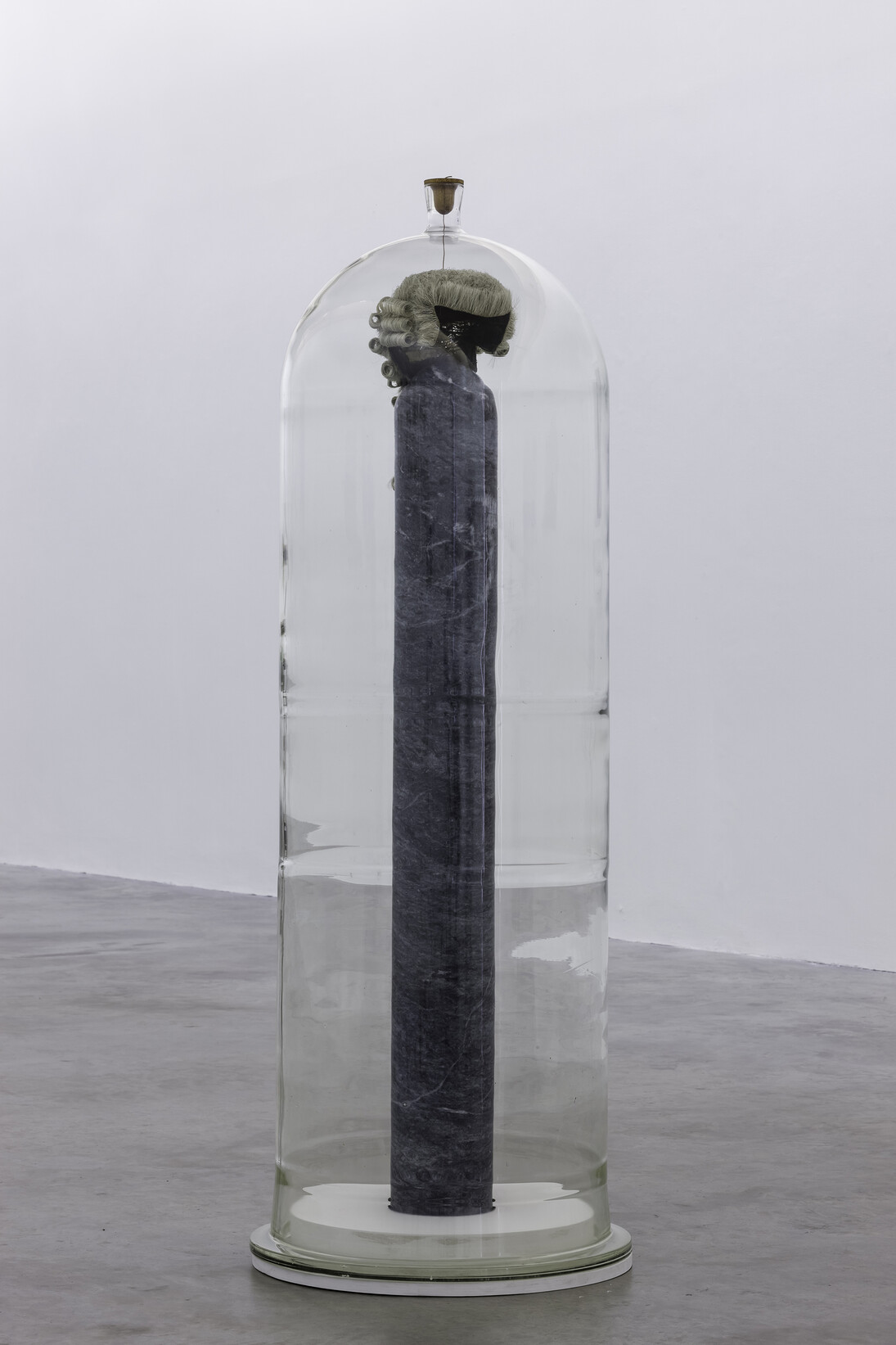 Dorothy Cross, Distil, 2014, barrister’s wig, marble, glass, leather, mahogany, height: 152 cm, diameter: 57.7 cm, height 59.8 in diameter 22.7 in, courtesy of the artist and Kerlin Gallery, Dublin 