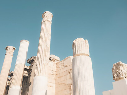 Experience the sun-drenched ruins of the ancient Greek city of Athens, with its iconic Erechtheion building standing as a testament to antiquity—a must-see destination for history enthusiasts