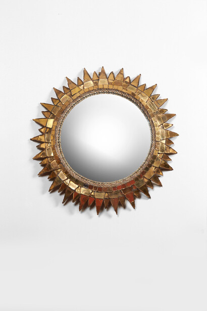 Line Vautrin, Soleil a pointes, c 1955, black Talosel frame encrusted with gold mirror. Exhibited by Galerie Marcilhac