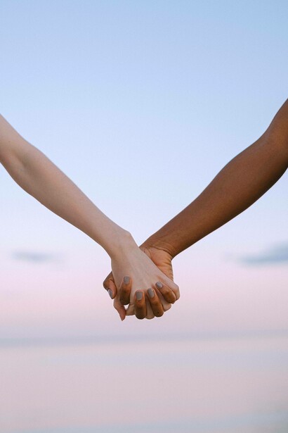 Couple holds hands