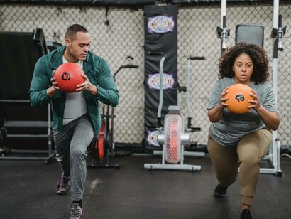 A duo working out hard to maintain their fitness levels