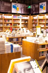A closed bookshop with a myriad of published books