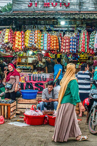 The bustling streets of Jakarta, Indonesia, are alive with food vendors serving up delicious local dishes like gado-gado, reflecting the city’s diverse cultural heritage