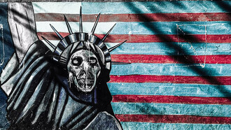 A wall painting of the American flag and a skull-shaped Statue of Liberty explores powerful themes of identity, decay, and national symbolism
