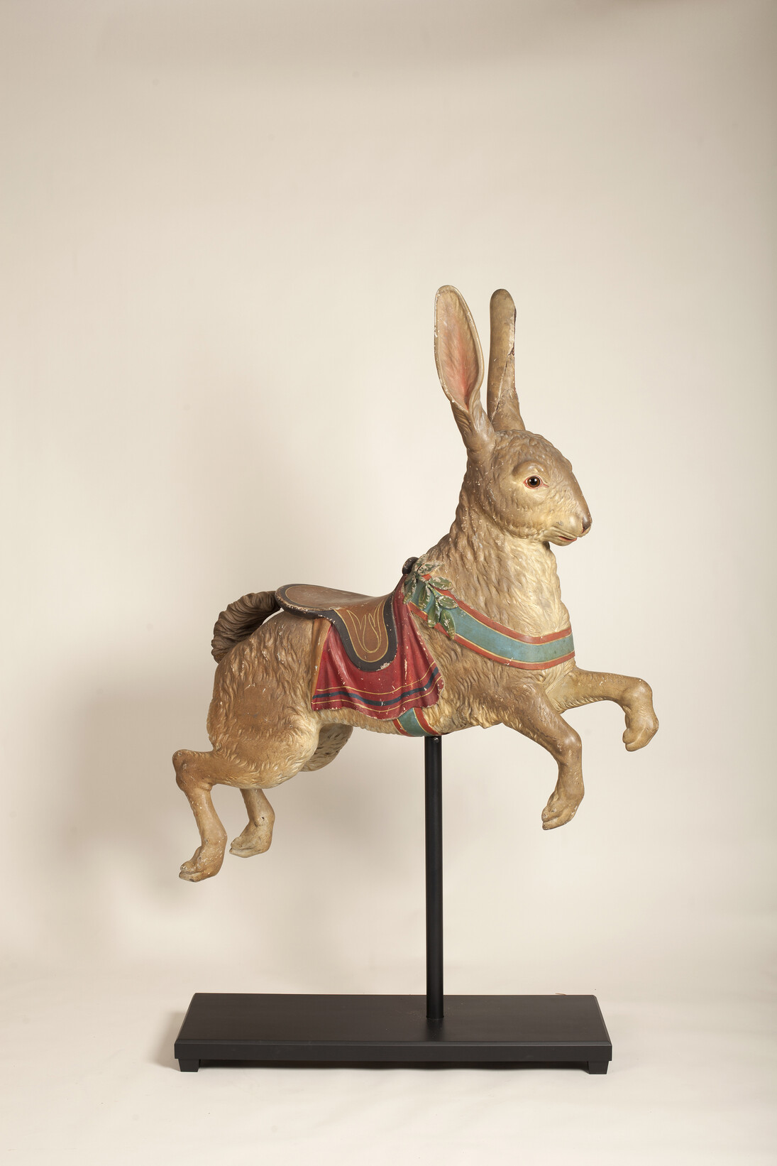 Rabbit Carousel Figure, Attributed to the Dentzel Company; possibly Salvatore Cernigliaro (1879–1974), Philadelphia, Pennsylvania, c. 1910, Paint on basswood, 73 x 50 x 13" (with stand). Photo courtesy of the Barbara L. Gordon Collection