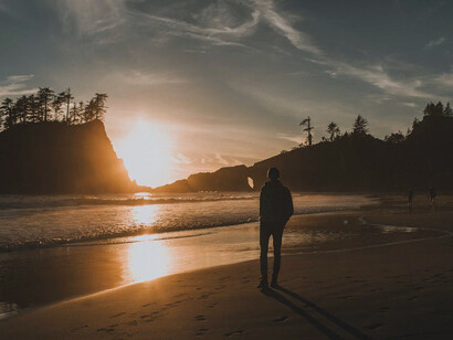 Standing alone by the ocean, gazing into the sunset, he finds a moment of solitude that brings forth the deepest reflections of his true self, unburdened by external judgment