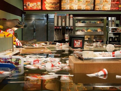 Superflex,
Flooded McDonald’s, 2009.

Video still. Video, 1920 x 1080, colour, stereo; 21 minutes. Courtesy of the artists.