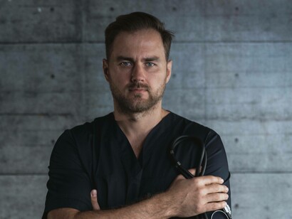 A doctor holding his stethoscope is ready to examine patience who have an autoimmune disease