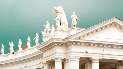 Rooftop of an old Greek temple with statues on top, Greece