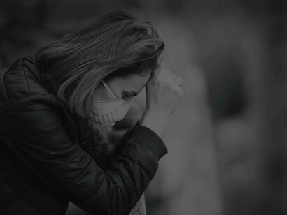 Fist on the head trying to navigate the stress energy out from the body or, at the very least, manage them as to offer some form of relief